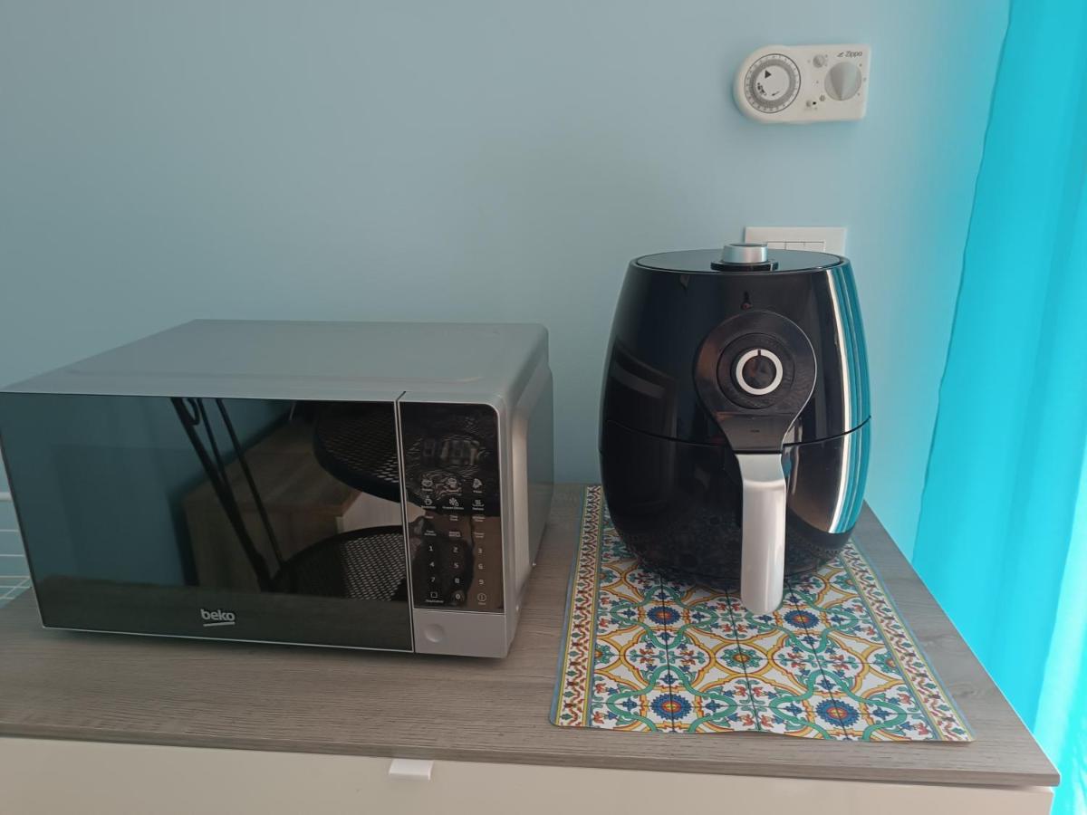 Casa Azzurra Apartment จีอาร์ดีนี นักซอส ภายนอก รูปภาพ